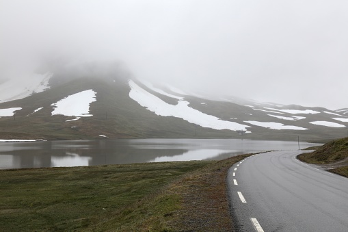 Lakeside road in Norway. Lake in Vikafjellet mountains.