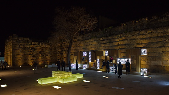 Derbent. Russia. April 09, 2021. The oldest stone wall between the Naryn-Kala fortress and the Caspian Sea. In the evening, this is a favorite place for recreation of residents of Derbent.