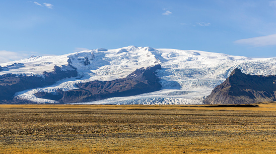Vatnajökull is the largest and most voluminous ice cap in Iceland, and the second largest in area in Europe after the Severny Island ice cap of Novaya Zemlya. It is in the south-east of the island, covering approximately 8% of the country.