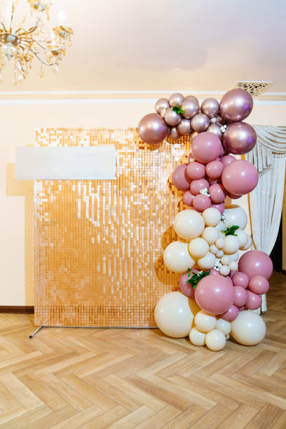 istock white and pink balloons on decorative panel with sequins for the photo zone 1450692162