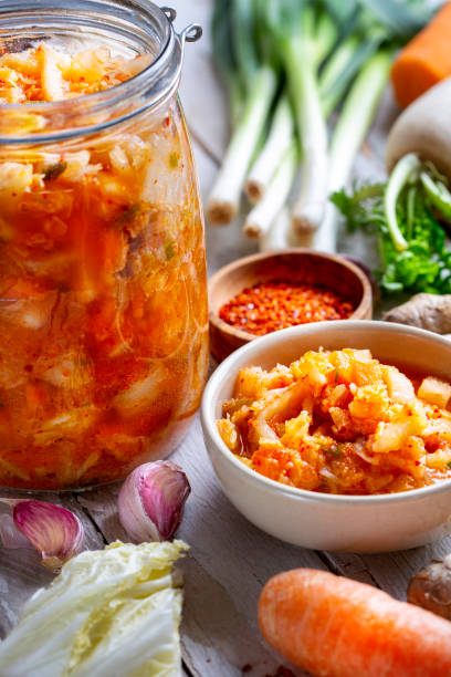 istock Homemade kimchee and glass jar 1450697135