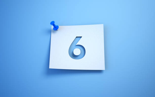 istock Number 6 cut on note paper, White note paper blue background 1450702044