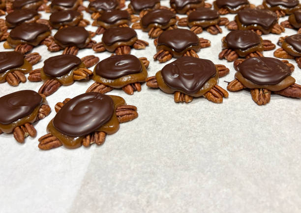 istock Chocolate Caramel Pecan Turtle Dessert Candies 1450704594