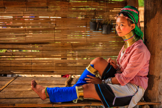 Portrait of young girl from Long Neck Karen Tribe Portrait of a long-neck young girl Padaung (Karen) tribe, Mae Hong Son Province in Northern Thailand. padaung tribe stock pictures, royalty-free photos & images