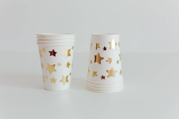 White paper disposable cup. Ecology concept. Paper dishware for party. White background.