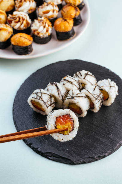 istock sushi rolls with salmon and daikon 1450709998