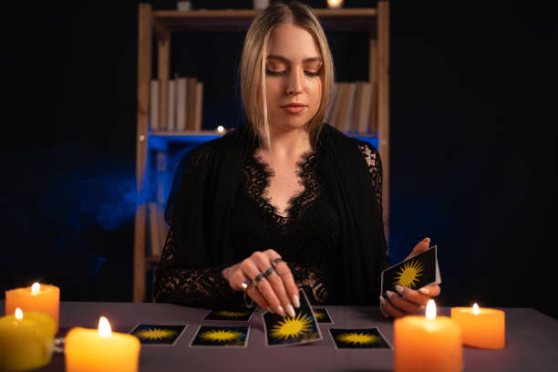 istock Fortune teller reading tarot cards. divination, astrology and esotericism 1450712268