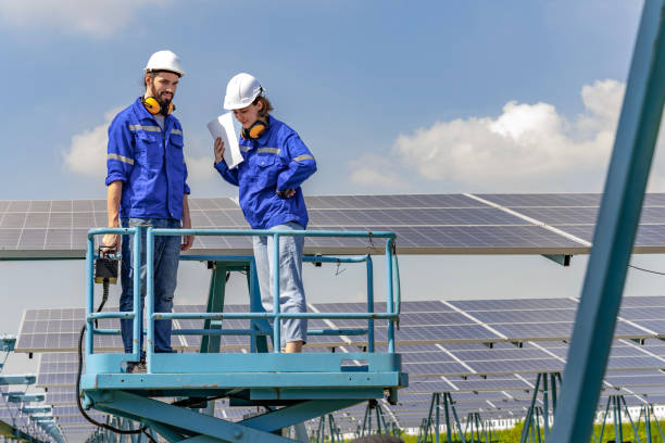 istock Electrical engineers are examining the working conditions of many solar panels to enable continuous power generation from solar energy. 1450717018