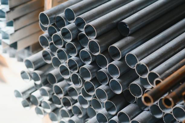istock Aluminium profile for windows and doors manufacturing. Structural metal aluminium shapes. Aluminium profiles texture. Aluminium constructions factory 1450748517