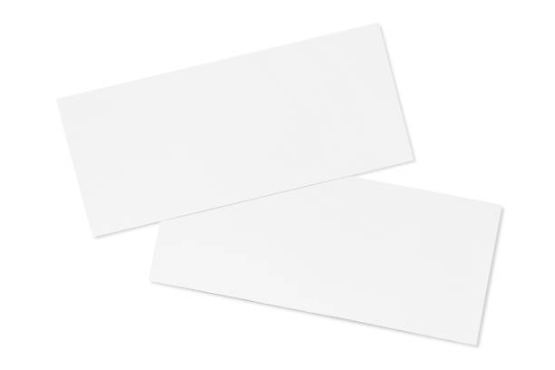 istock Two paper or plastic pieces (cards, tickets, flyers, invitations, coupons, banknotes, etc.), isolated on white 1450750464