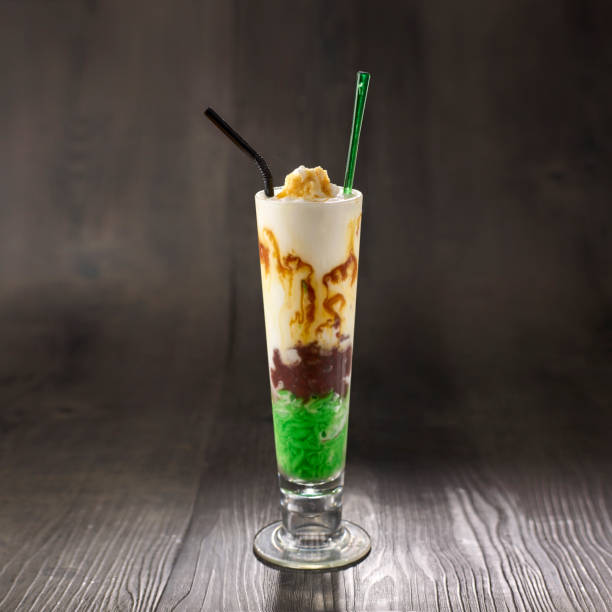 istock Cendol Sling shake with straw served in glass isolated on table side view healthy morning drink 1450753316