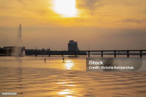 Sunset In The City Of Dnieper On The Background Of The Bridge In The Summer Evening Stock Photo - Download Image Now