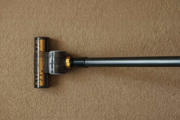 istock Vacuum cleane nozzle on the carpet. 1450755766