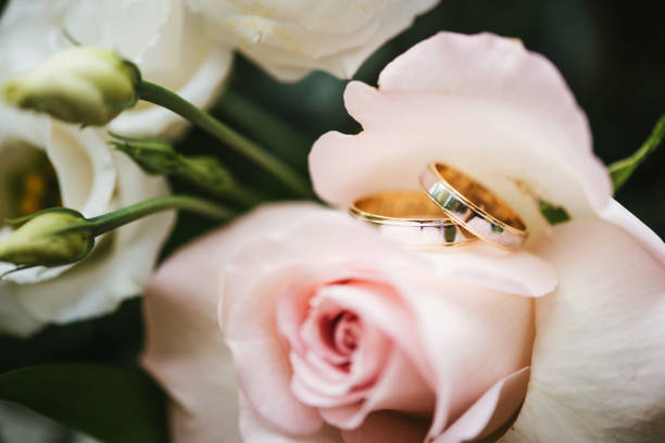 istock Wedding Rings and roses 1450757335