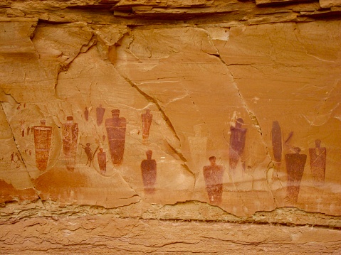 The famous Great Gallery in Horseshoe Canyon is 200 feet long, 15 feet high, and contains dozens of fascinating red, brown, and white pictographs. The panel is believed to be thousands of years old and was created during the late archaic period. It contains one of the finest displays and best preserved of prehistoric Indian rock art in the United States. Located in a detached unit of Canyonlands National Park in Utah, this area was added to the park in 1971 to protect this amazing collection of rock art.
