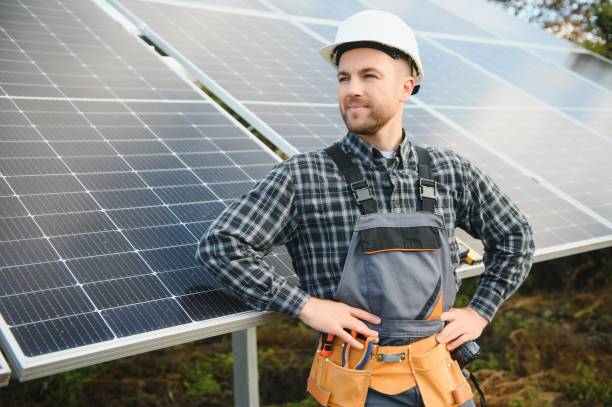 istock Worker installing solar panels outdoors 1450757978