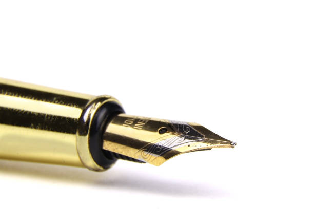 istock Golden fountain pen isolated on a white background 1450758514