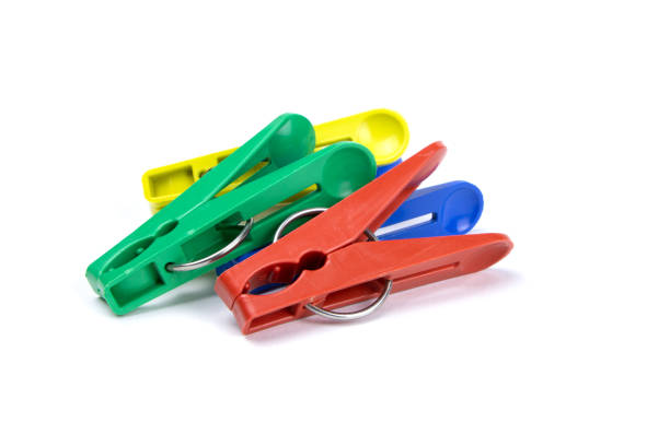 istock Set of multi-colored linen clips isolated on a white background 1450758768