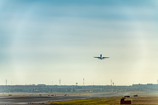 Travel ban concept because of Coronavirus: airplane shadow in the sea (flights forbidden).