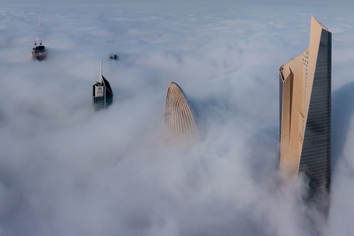 kuwait city, Kuwait – February 09, 2021: An aerial view of the spectacular Al Hamra tower skyscraper rising above clouds