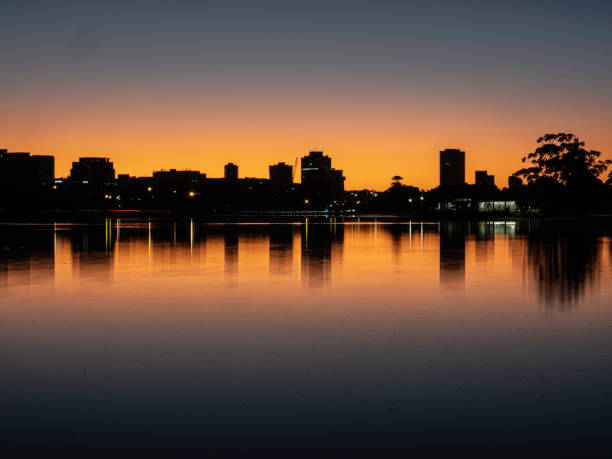 istock Urban skyline reflections at dawn 1450779216