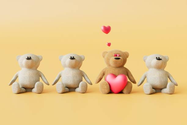 istock a teddy bear in love with a heart next to other bears on a beige background. 3D render 1450785940