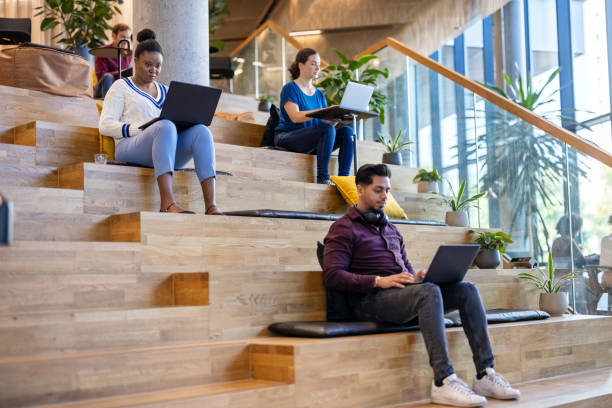 istock Multiracial business people working at creative coworking office 1450789079
