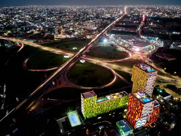 A picturesque night view of the mall area illuminated with colorful lights in Accra, Ghana