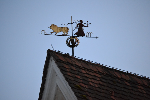 metal wind indicator on a roof in bavaria