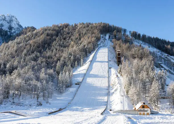 Ski Jump in Planica near Kranjska Gora Slovenia covered in snow at winter time.