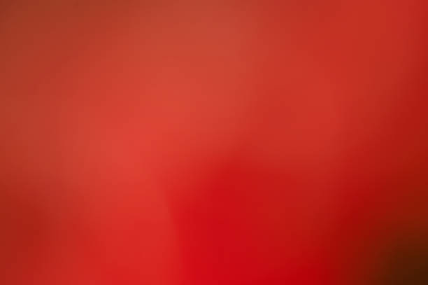 istock Abstract red defocused background. Blurred background red with black. 1450809801