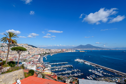 Naples, Italy aerial skyline on the bay with Mt. Vesuvius in the day.
