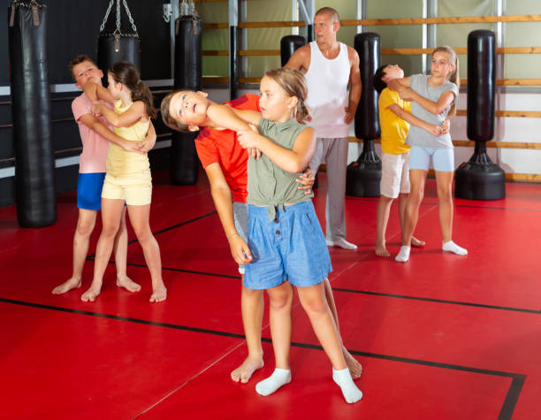 istock Children self defense training in gym 1450811665