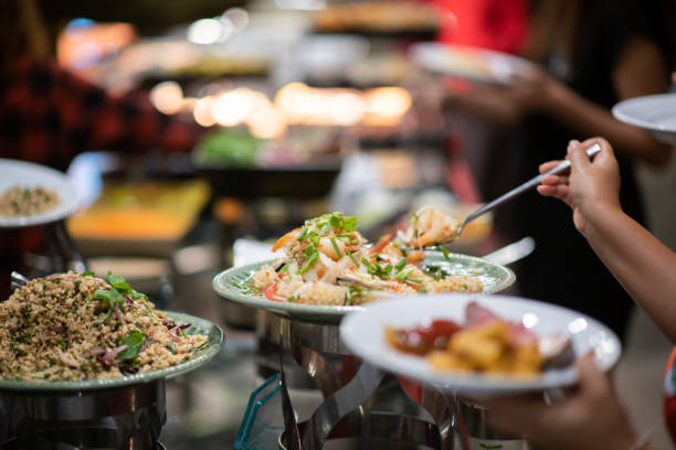 istock scooping the food, catering, dinner time 1450839026
