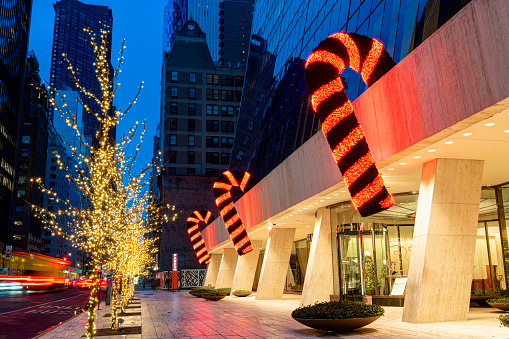 Manhattan, New York, USA - December 12, 2022:   Solow Building Plaza (9 West 57th Street) at Christmas. View from West 57th Street, Manhattan.
