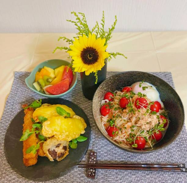 istock noodles, eggs, various fruits, and fried foods 1450868940