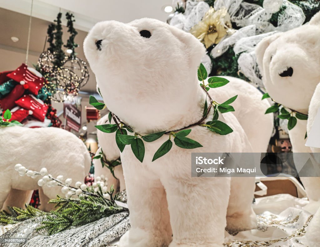 Christmas stuffed polar bear. Teddy bear in a big store. Peluche de oso polar navideño en tienda grande. Christmas Stock Photo