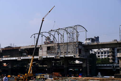 17 December 2022, Pune, India, Construction of Pune metro bridge for Pune Metro Rail Project, erection of steel segments.