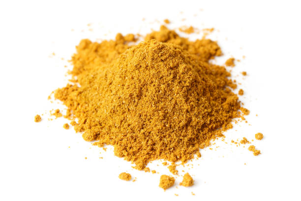 istock Pile of curry powder isolated on white 1450873460