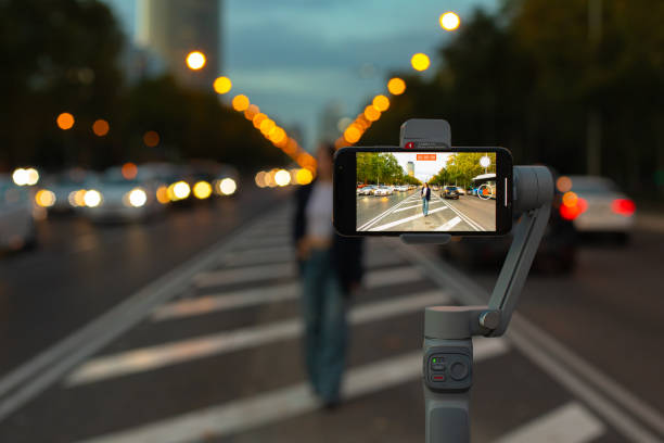 istock Woman taking selfie on road 1450873506