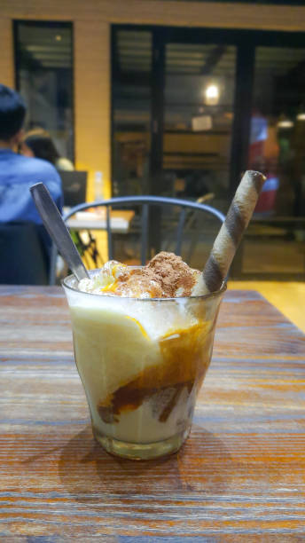 istock espresso poured over vanilla ice cream. 1450891593