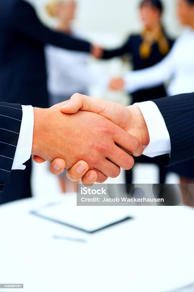 Business people shaking hands Achievement Stock Photo