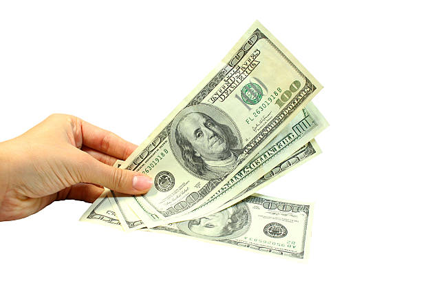 Hand and dollars stock photo