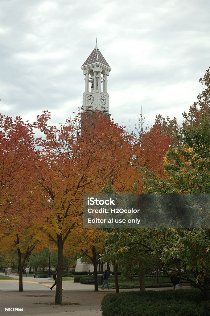 Purdue University Clock Tower Purdue University Clock Tower amidst fall colors Campus Stock Photo