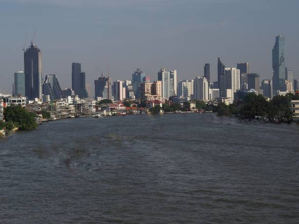 istock River and blue sky, gray and white buildings 1450911544