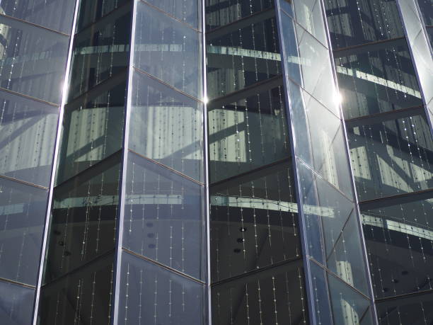 istock Silver-grey-black-gray buildings and glass and white lights. 1450911755