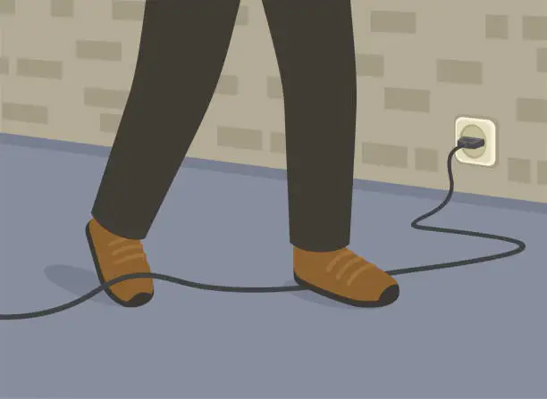 Vector illustration of Close-up view of foot caught in electrical cord tripping over it at home or office.