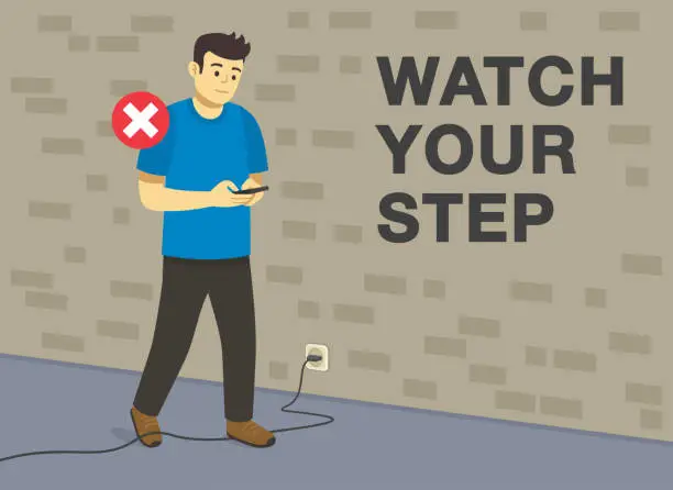 Vector illustration of Young male character using mobile while walking and about to fall down. Foot caught in electrical cord tripping over it.