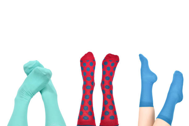 istock Woman in blue socks isolated on white background. Top view. 1450922588
