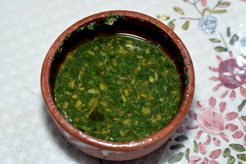 Mulukhiyah, also known as molokhia, molohiya, or ewedu, a dish made from the leaves of Corchorus olitorius, commonly known in English as denje'c'jute, nalta jute, tossa jute, mallow or Jew's Mallow, selective focus